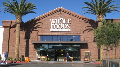 Shoppers walk into the Fremont Whole Foods on Thursday, October 17, 2013. Fremont is now one of the five locations in the Bay Area.