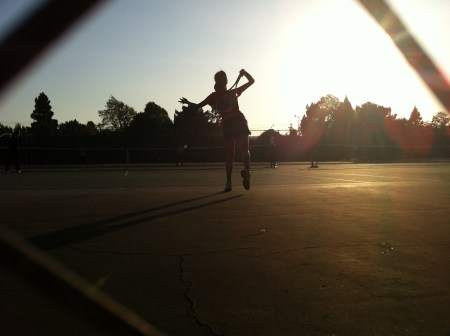 Senior Amy Le prepares to return a volley against her Washington opponent. The girls’ tennis team ultimately wrapped up the season with an even seven wins and seven losses. “I would like to thank [the team] for their dedication and hard work! Having them come to practice everyday has motivated me to become a better player and helped me stay competitive during matches,” Bhamidipati said. PC: Tejaswini “Teja” Cherukuri