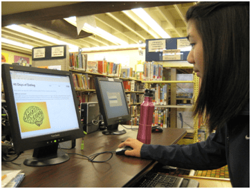 Junior Amy Chang reads the entries on the 40 Days of Dating website on October 10, 2013. The website features graphic design pieces for each entry and also includes various gifs and videos. PC: Priscilla Ng