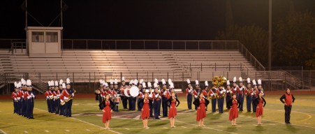 Nov. 16, 2013 — The American High School Marching Band performs one last time for the audience. Consisting of color guards and other instrument players, the marching band won third place for its field show at Fairfield High School. “I love how in [events like these], in one concentrated area, there is just this love for band,” drum major Michelle Tam (12) said. //PC: Navya Kaur
