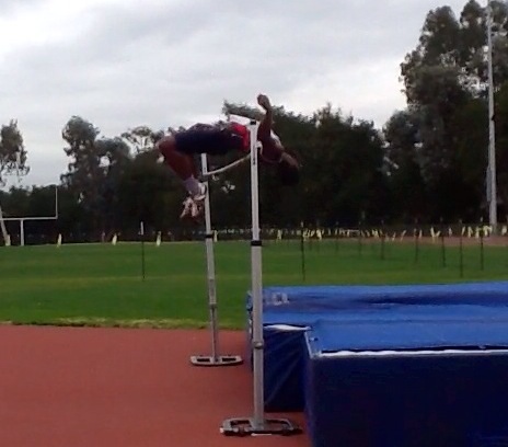 Senior David Chukwu competes at the Los Gatos All-Comers meet at Los Gatos High School. Chukwu credits his father, his coach, and senior Ruthvik Sunilkumar for introducing him to the sport and encouraging him to continue it. “I am feeling optimistic about this upcoming season,” Chukwu said. “I can only hope that I am able to break that 7-foot mark. I am excited and nervous. I have many emotions that walk hand in hand with each other when it comes to jumping.” PC: Dean Gor