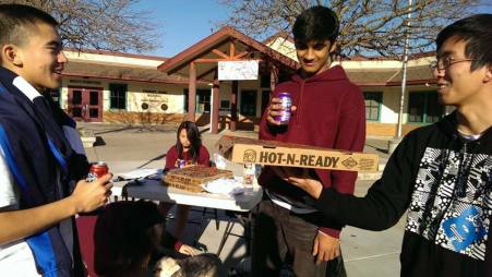 Seniors David Shan, Ruvan Jayaweera, and junior Daniel Ma take a quick snack break after passing out flyers in the Forest Park neighborhood. Because all the flyers were handed out, LEO Club members are cautiously optimistic about next weekend’s results. “In terms of donations, we haven't really set a goal for ourselves,” Gupta said. “We have never done this type of a drive at this scale so we don't really know what is realistic.” PC: Arjun Gupta 