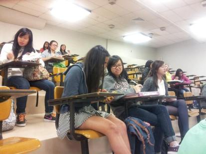 In between speeches, Key Club members study their ballots.  Candidates running for the same position could not be present while one was speaking, so they waited outside in the hallway.  “I like how we got freshmen involved,” junior Chloris Li said.  “We get to know each other better and it makes it more personal.”  PC: Caroline Lee