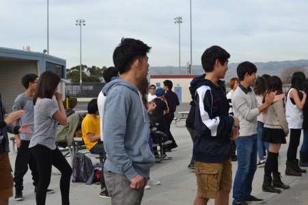 Students practice to Psy’s “Gentlemen” after school on Tuesday, February 11, 2014.  During the week of February 17--the week before the rally--Korea Club met every day during lunch and on the weekends.  “Awesome people all go to practices,” senior Lanna Tau said.  “Everyone is really organized and there is a lot of practice so you know the dances well.”  PC: Kristina Kong