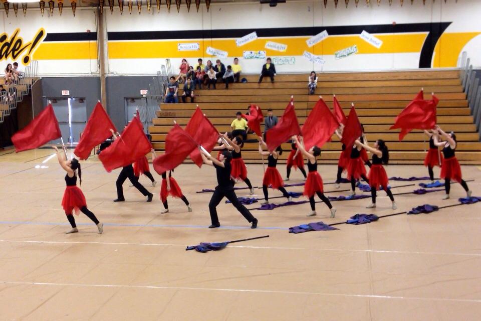 The Winter Guard performs their routine to “Gravity” at Granada High School in Livermore.  This was the second of two of the competitions both the guard and percussion went to on Saturday, March 15, 2014.  "This competition gave the first-time members an idea of what competitions are like,” senior Molly Farmer said.  “Now that everyone knows what to expect, we can do even better at our next competition this Saturday [March 22].” PC: Leesa Choy