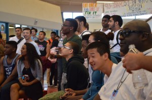 Students watch the lunch-time activity on Wednesday, April 30, 2014, as Mr. Fulton asks volunteers questions typically known by only one gender.  For this day of Battle of the Sexes, girls dressed as beauties and boys as geeks. “Wednesday was the best day,” senior Grace Wheaton said.  “All the girls looked so great.”  PC: Caroline Lee