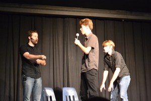 Ben Stevens and Sean Taylor act out an improvised Shakespeare scene on the spot with some help from senior Trevor Broberg. PC: Megumi Kamikawa.