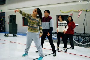 Seniors Keani Turangan, Sean Acidera, Megan Chinn, and Emmy Lancandazon perform a self-choreographed routine at the Interact Area 4 Benefit Showcase. The crowd reacted well to the team’s innovation. “ The aerials and flips always get a good reaction from the crowd, people in the air just seem enjoyable to everyone,” Lacandazon said.  PC: Jessica Huynh