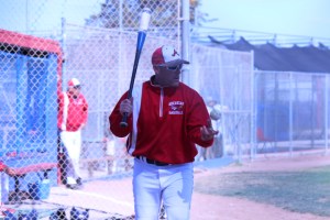American’s new varsity head coach, Steve Jespersen, hits infield to his team before the American v. Newark Memorial game held on April 24, 2015. The addition of Jespersen marks American’s first new varsity head coach in over a decade.
